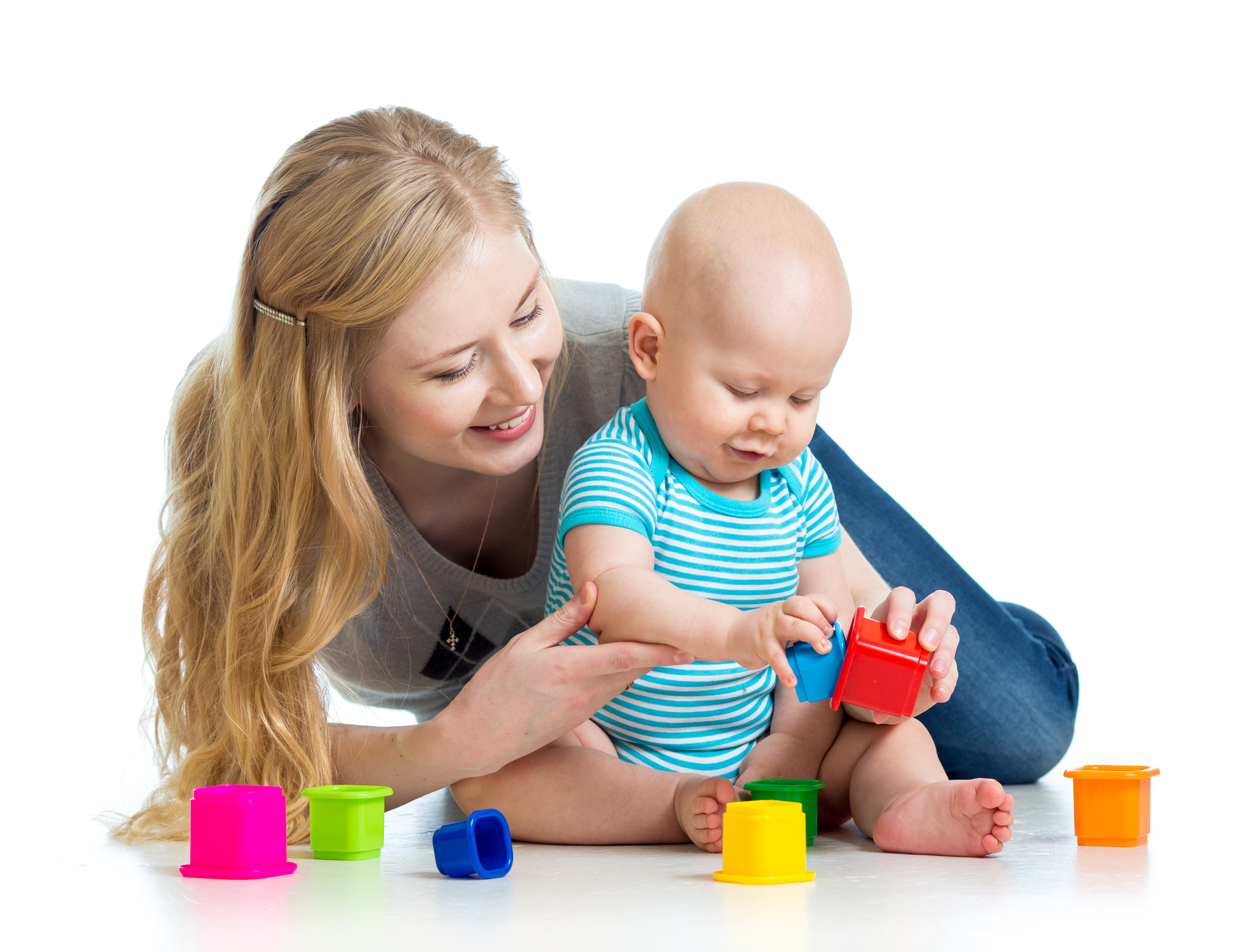 kid boy and mother playing together with cup toys